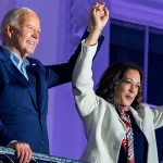 president-joe-biden-and-vice-president-kamala-harris-join-holding-hands-raised-after-watching-fireworks-white-house-balcony-4tho
