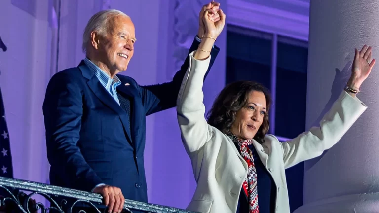 president-joe-biden-and-vice-president-kamala-harris-join-holding-hands-raised-after-watching-fireworks-white-house-balcony-4tho